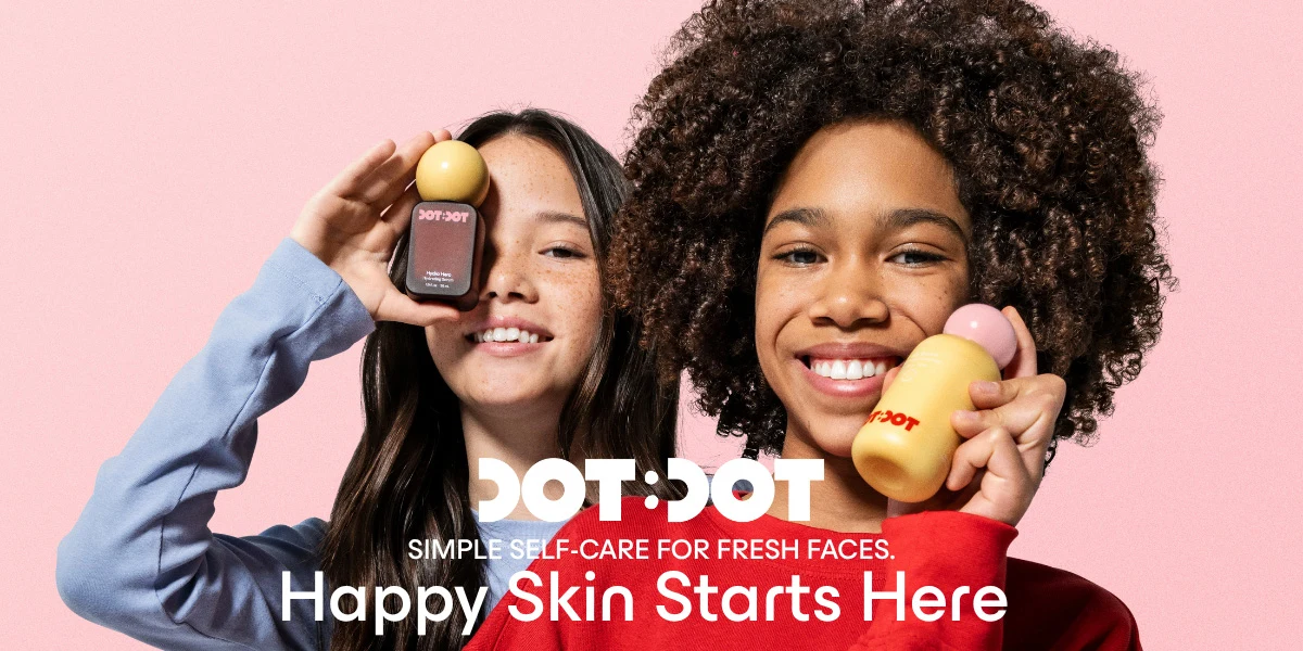 Two smiling kids hold Dot:Dot skincare products on a pink background. Text reads Simple Self-Care for Fresh Faces, Happy Skin Starts Here.