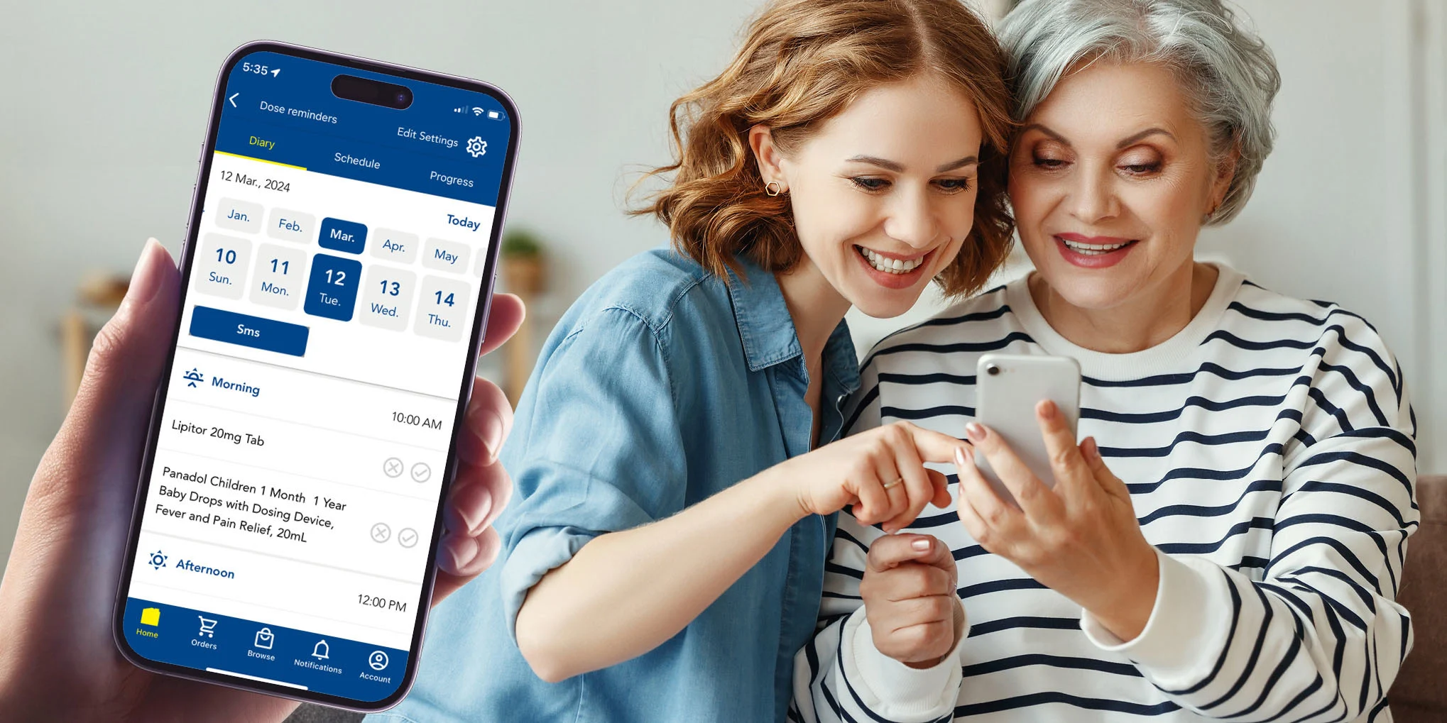 A daughter helping her mother with the Chemist Warehouse App 