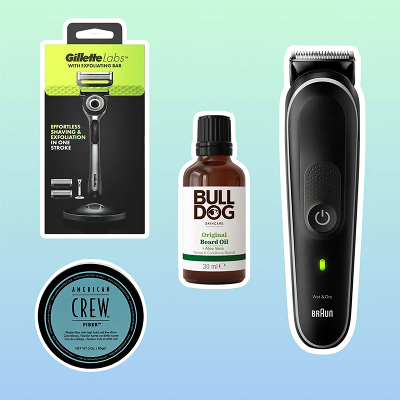 Collection of men's grooming products including Gillette razor, Braun trimmer, Bulldog beard oil, and American Crew hair fiber on blue background.