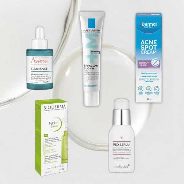 Five skincare products arranged on a light background: Avène Cleanance serum, La Roche-Posay Effaclar, Dermal Acne Spot Cream, Bioderma Sébium Serum, and Medicube Red Serum.
