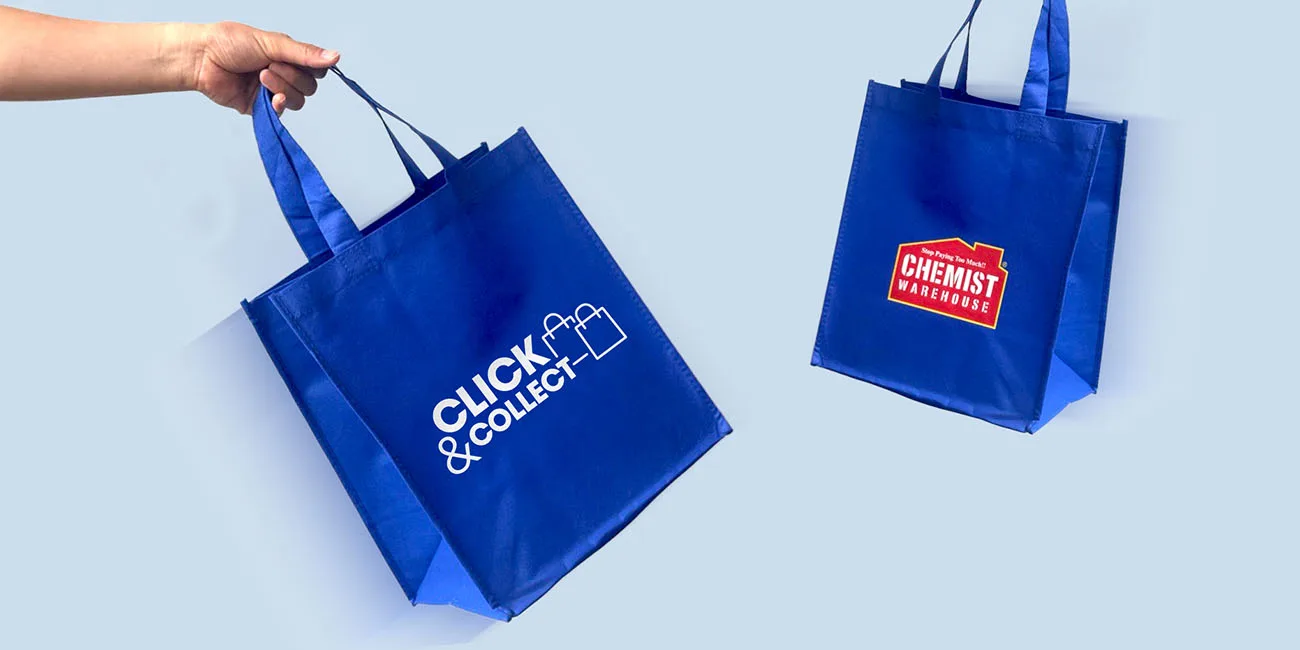 Blue shopping bags with the Click & Collect and Chemist Warehouse logos