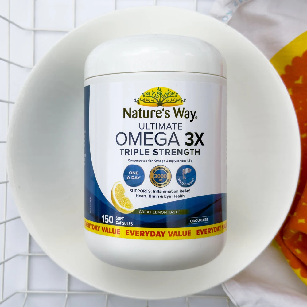 Nature's Way Ultimate Omega 3X Triple Strength vitamin in a while bowl