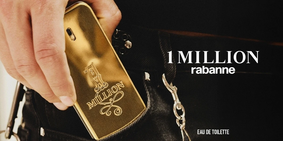 Fashion advertisement showing model in black outfit against dark background, with golden Paco Rabanne Million perfume bottles displayed