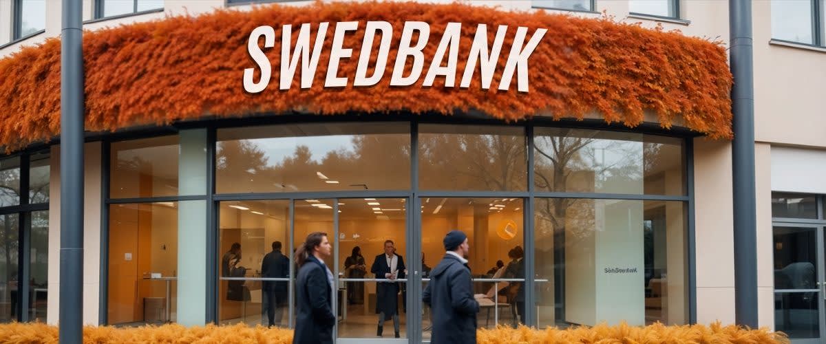 Swedbank stock dividend 2024: A Swedbank bank branch surrounded by vibrant autumn foliage.