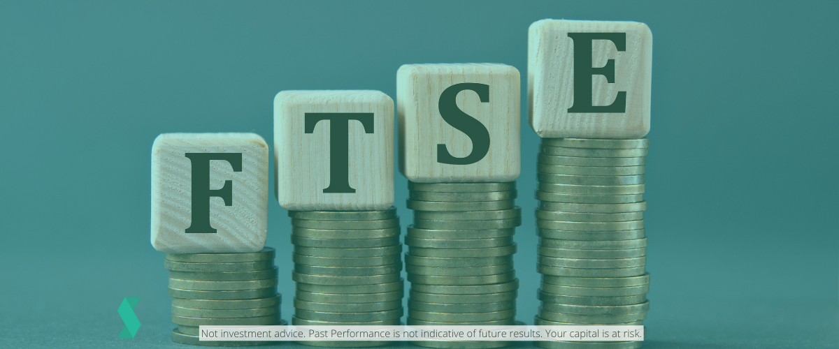 FTSE woodenblock word on top of coins