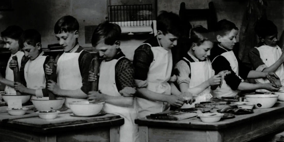 A group of children in a cooking class
