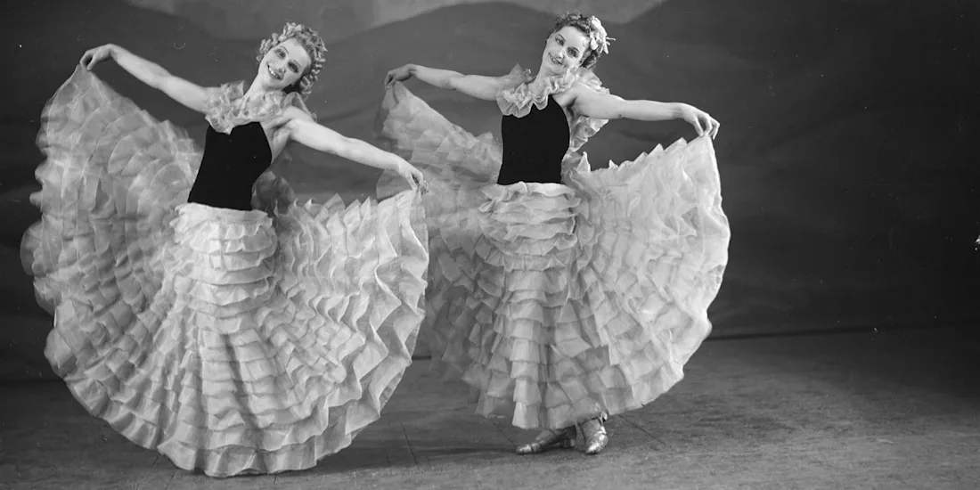 Dancers holding out their skirts