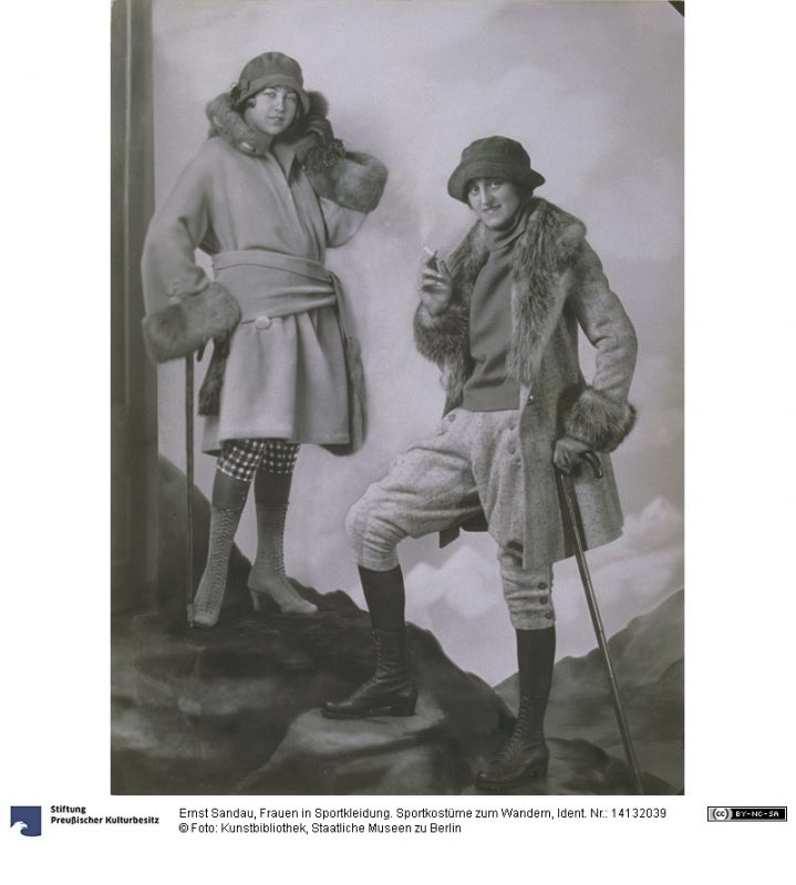 two women dressed in sporty outfits from the nineteen twenties