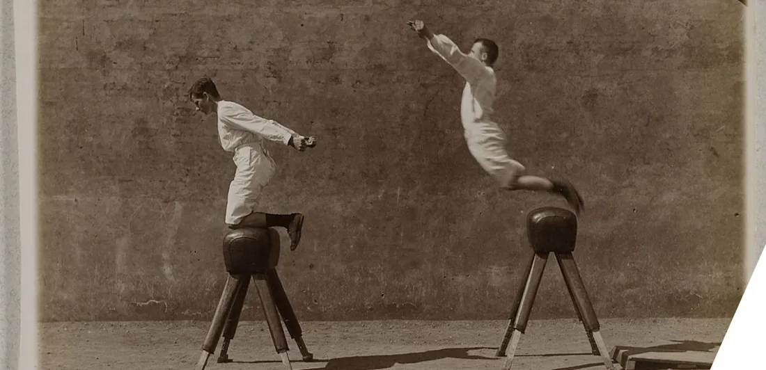 Gymnasts training on short beams