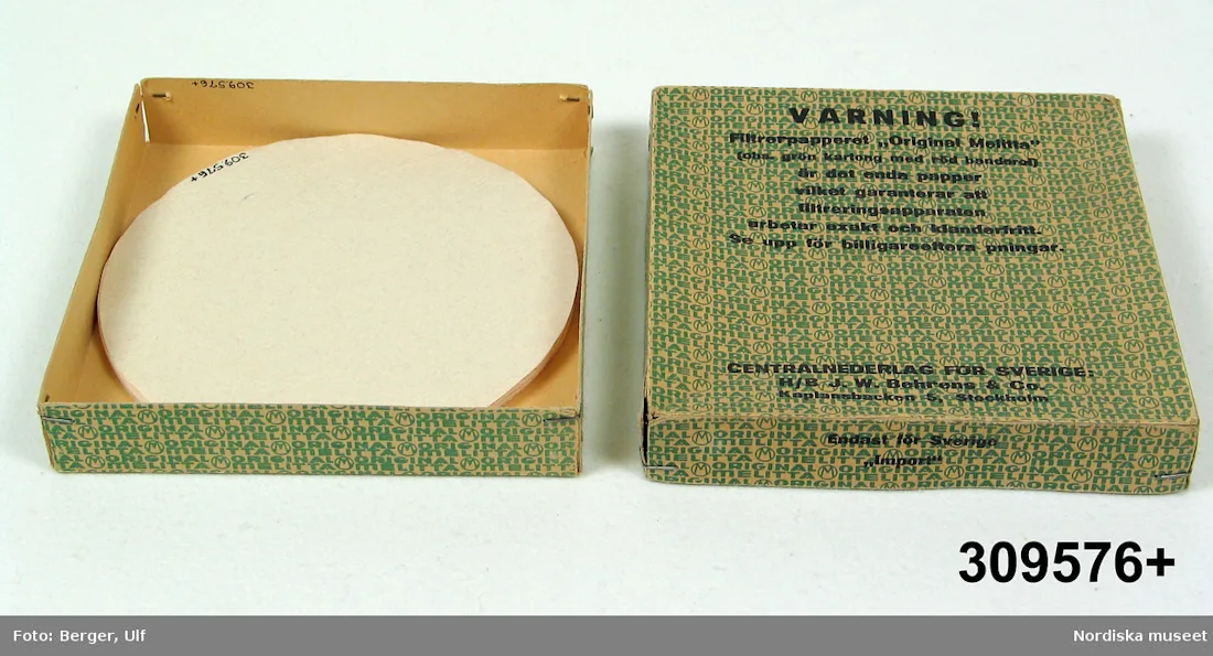 colour photograph of coffee filters in a green and yellow box