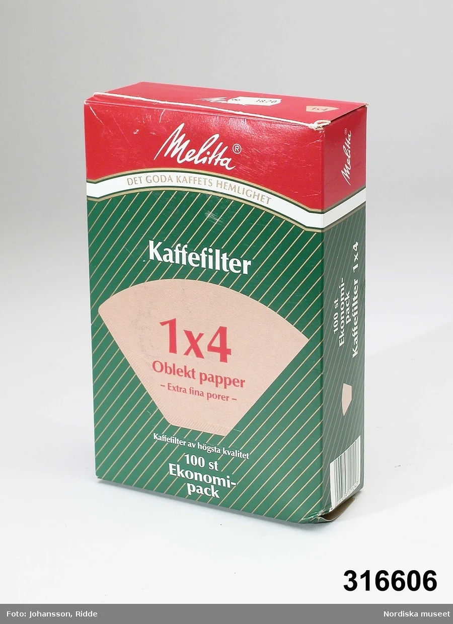 colour photograph of a red and green coffee filter box