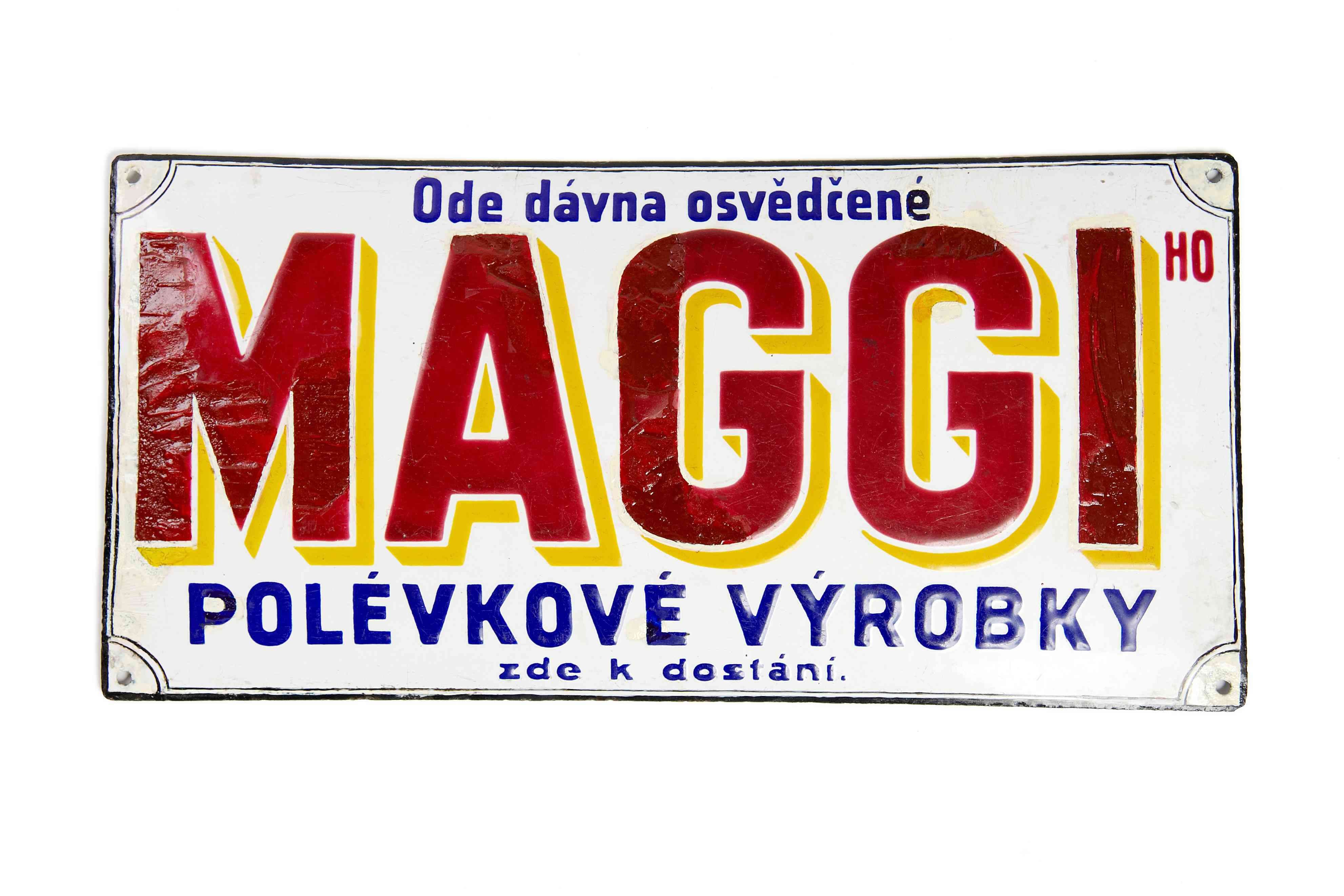 sign with blue text and the word MAGGI in yellow and red.