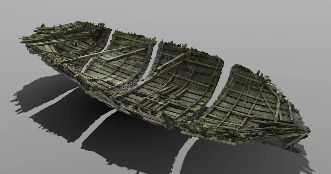 Partially reconstructed wooden shipwreck with visible ribs and planks, isolated on a plain background.