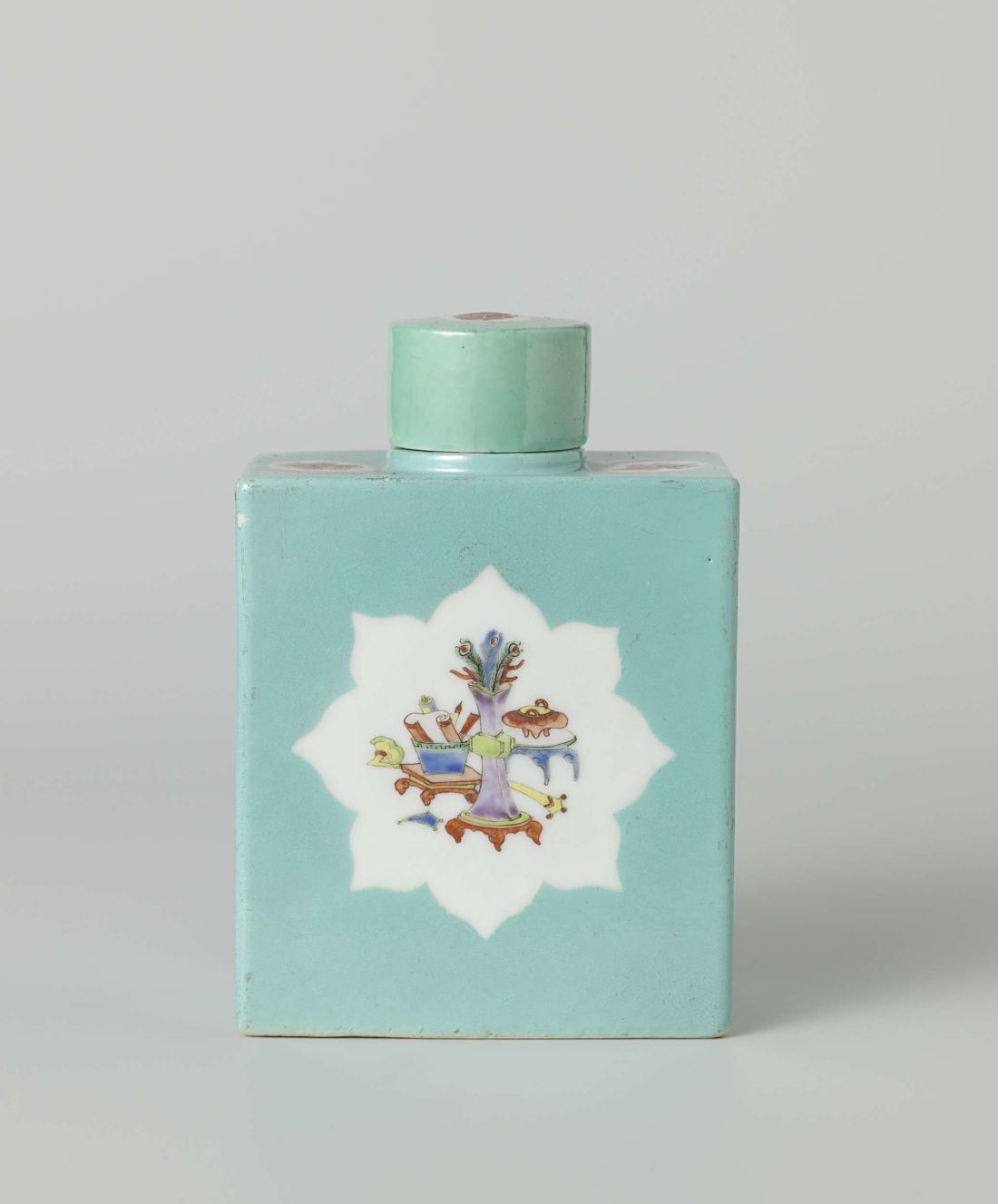 a bright blue glazed rectangular earthenware box, with a round lid.