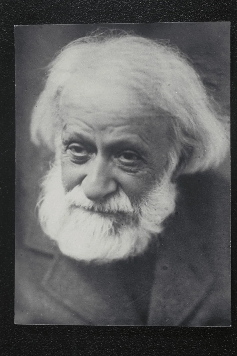 black and white portrait photograph of Siegfried Brie, a white-haired man with a beard
