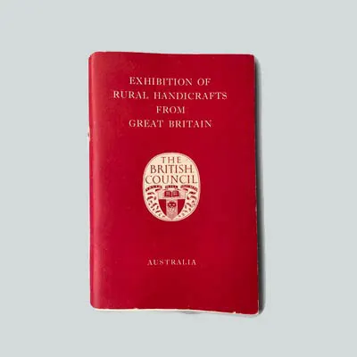 colour photograph of a catalogue with a red cover