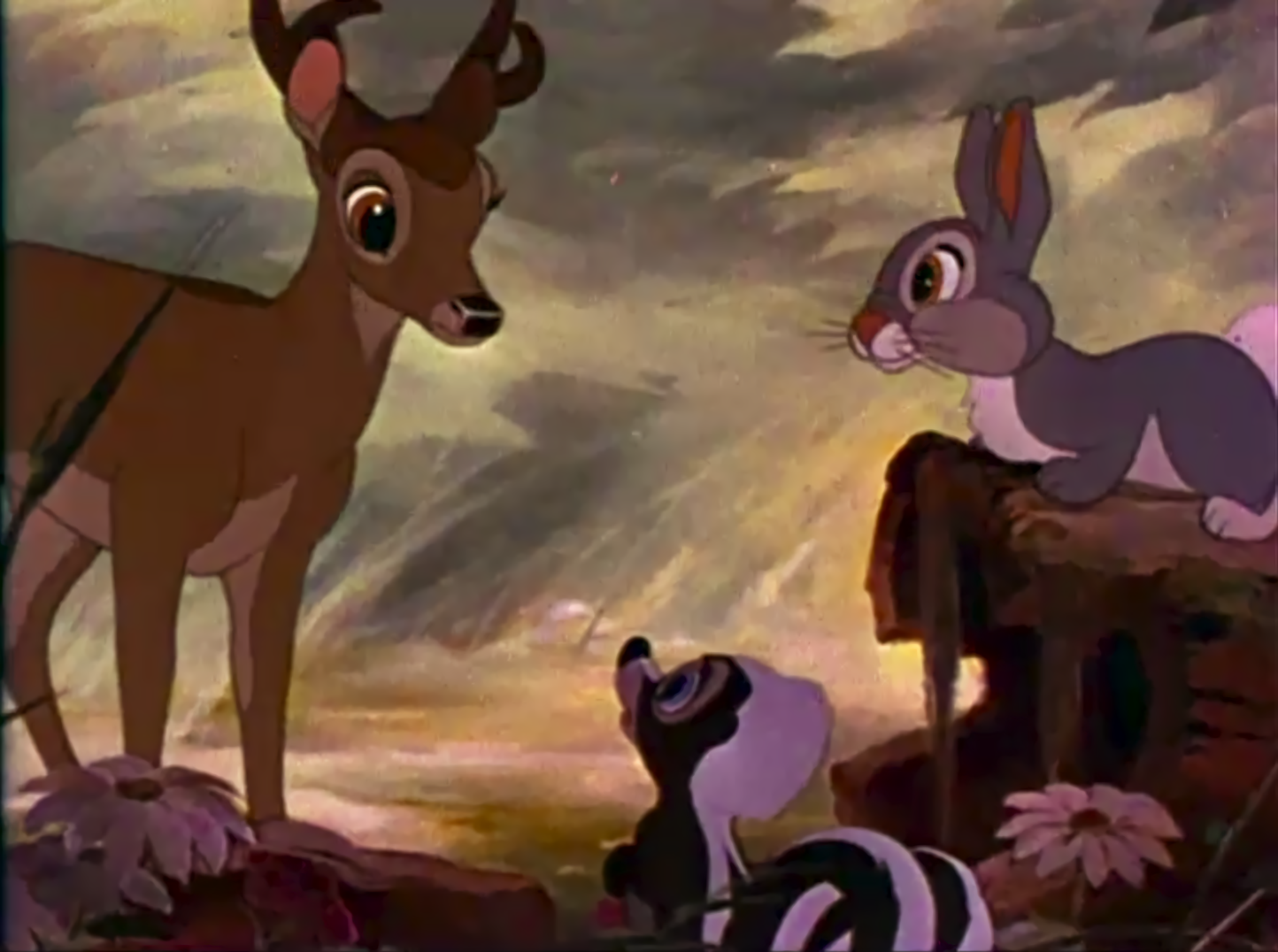 colour cartoon image of a deer, rabbit and skunk.