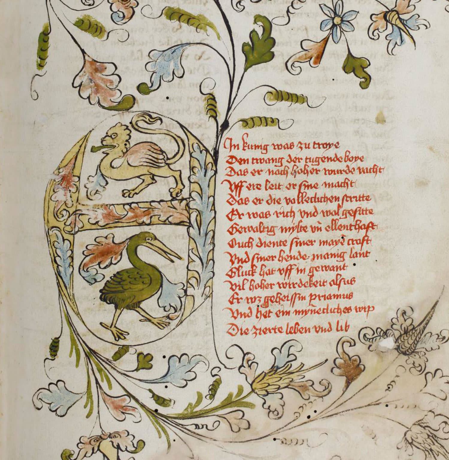 A decorated initial with images of flowers and animals, next to the calligraphed text of the manuscript 'Trojanerkrieg' by Konrad von Würzburg