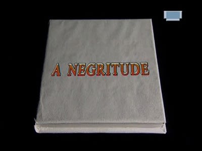 un livre blanc avec les mots « A Negritude » qui se traduit a « La Négritude ».