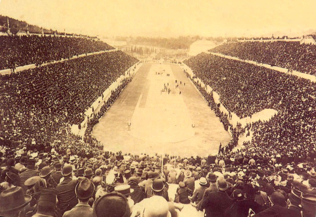 black and white photograph, a crowded Olympic stadium in Athens.