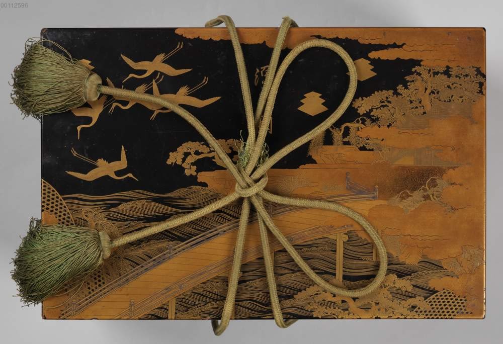 the wooden inlaid cover of a 17th Century manuscript version of the Tale of Genji