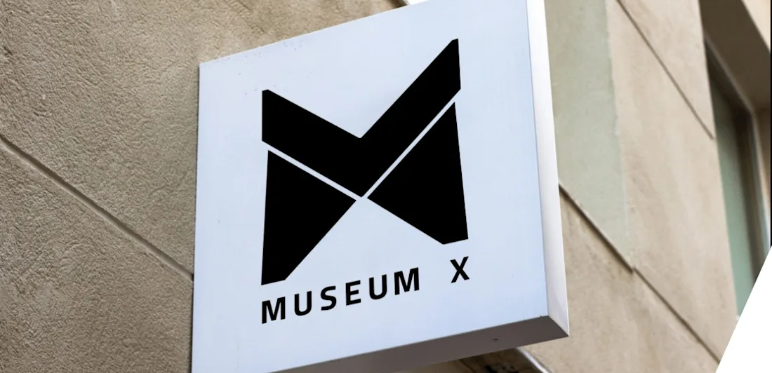 Museum X logo.
