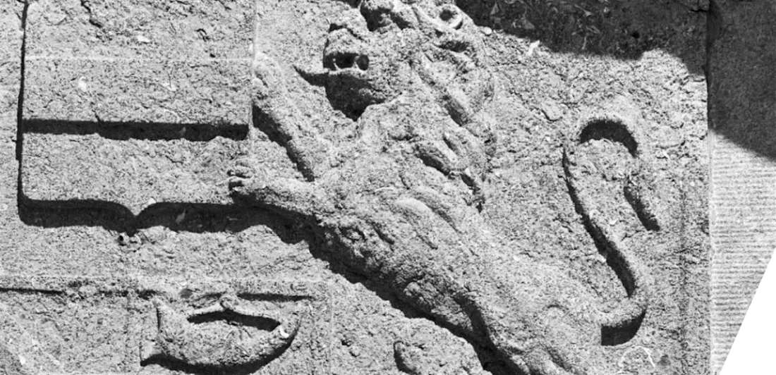 Figure of a lion carved in stone