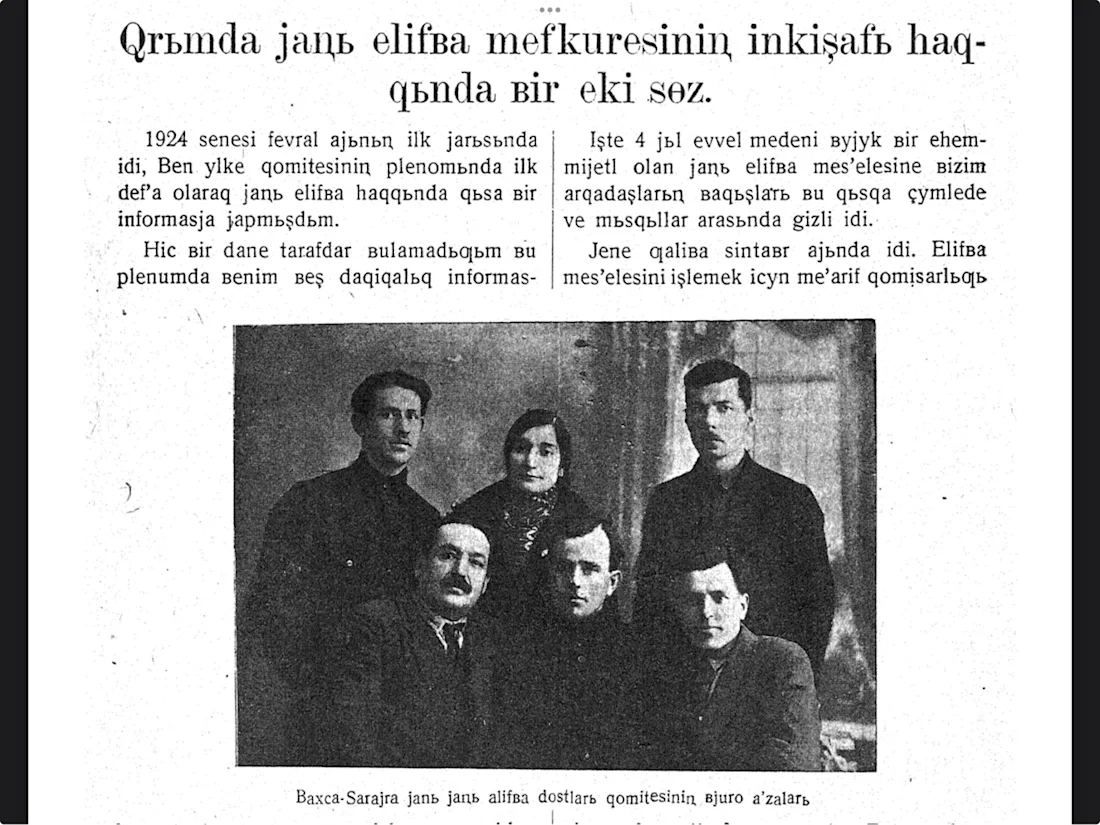 The front page of an academic and cultural monthly magazine showing the implementation of the new Latin alphabet for the Crimean Tatar language. The cover includes both the masthead and the beginning of an article about the development of the new alphabet movement in Crimea.