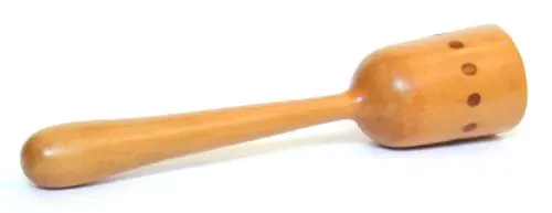 colour photograph of a small wooden potato masher
