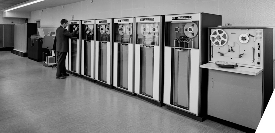 A man working on large data processors