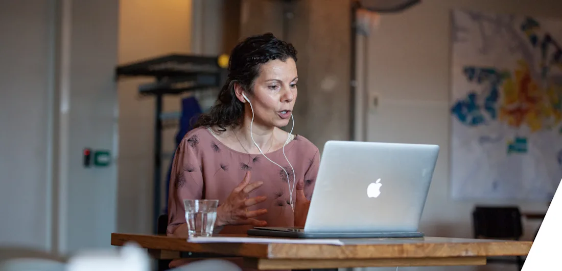 Maaike Verberk sat working at a computer