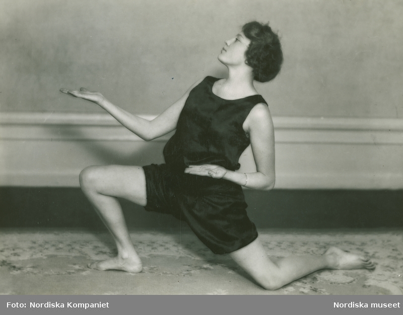 Woman in a two-piece gymnastic suit,