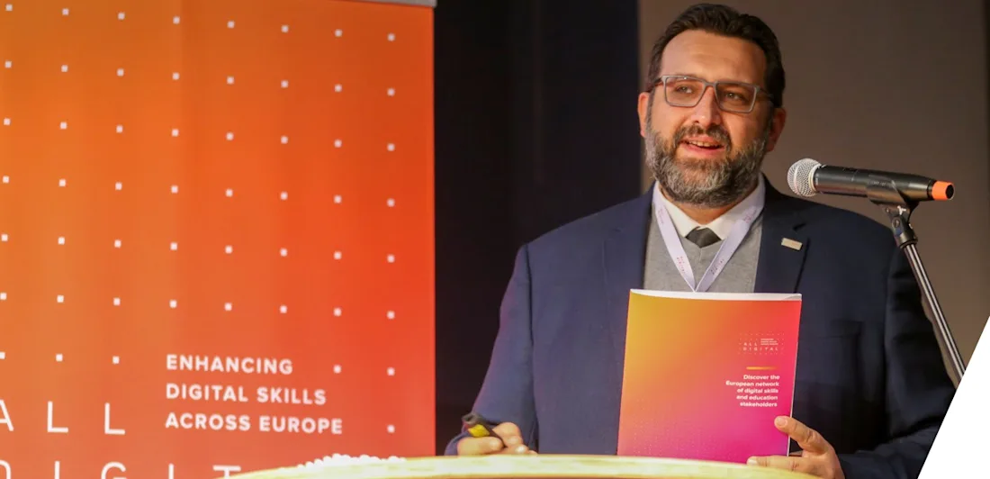 Altheo Valentini speaking into a microphone
