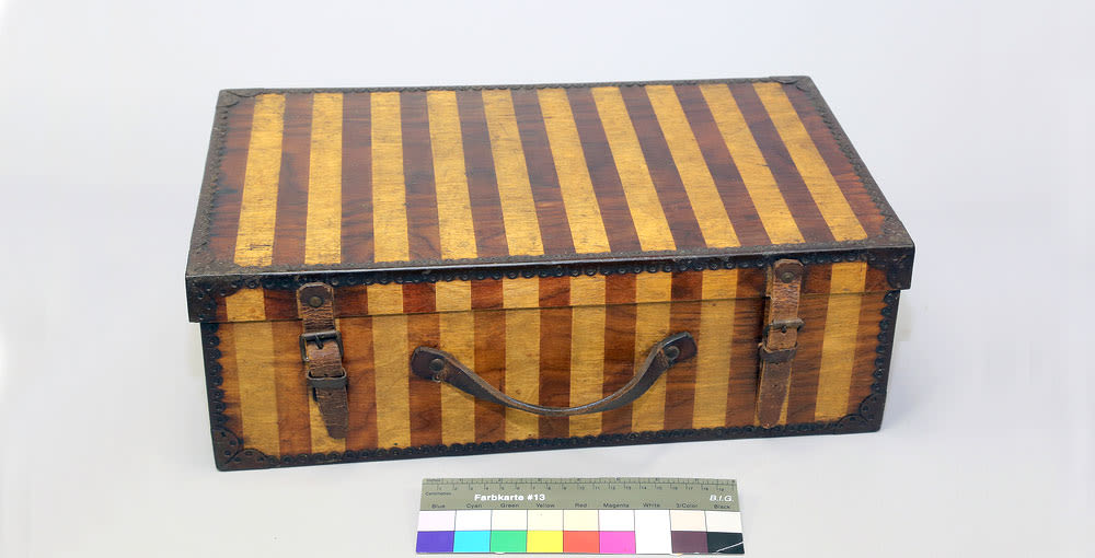 A striped suitcase