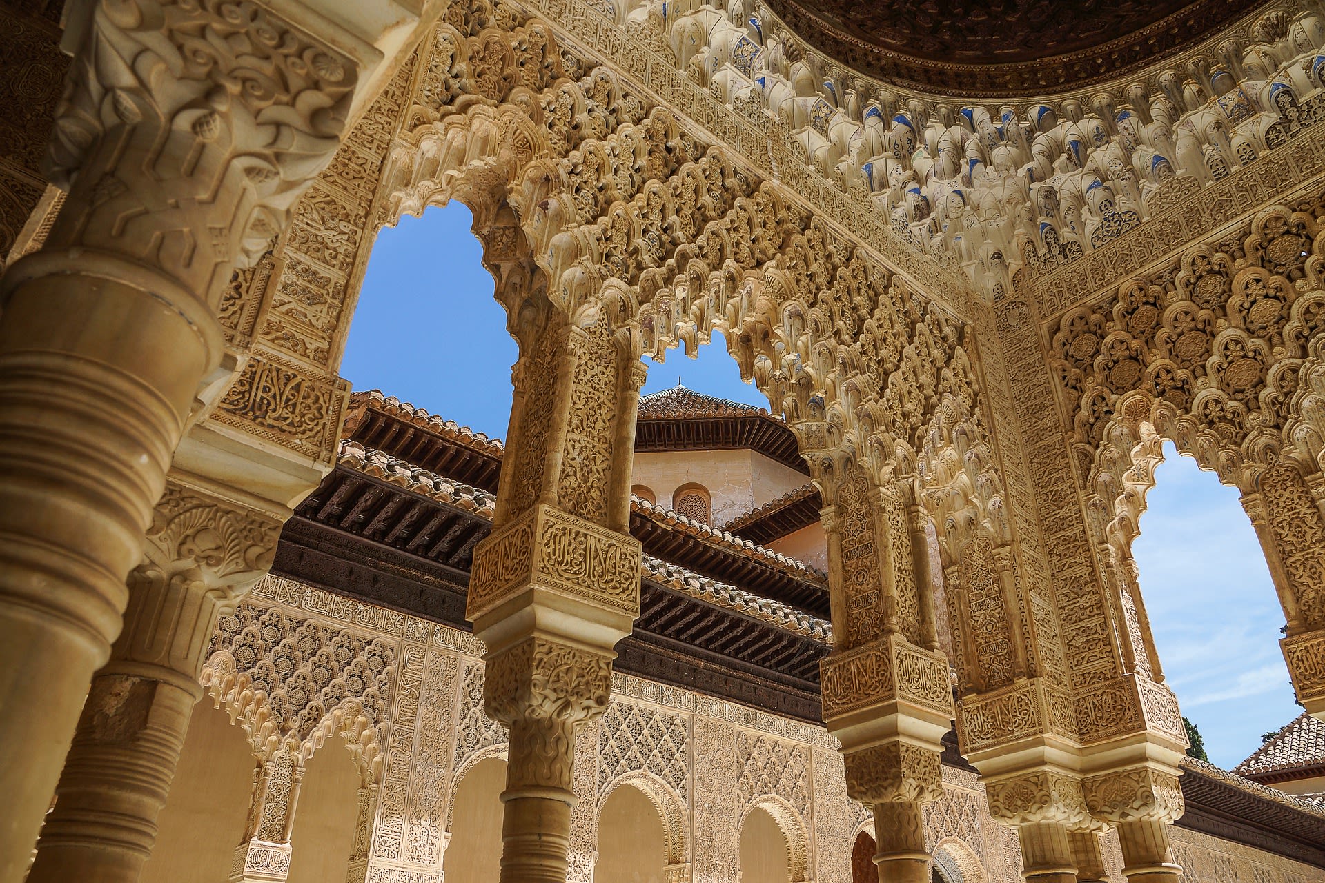 parts of intricate architectural features inside the Alhambra Palace