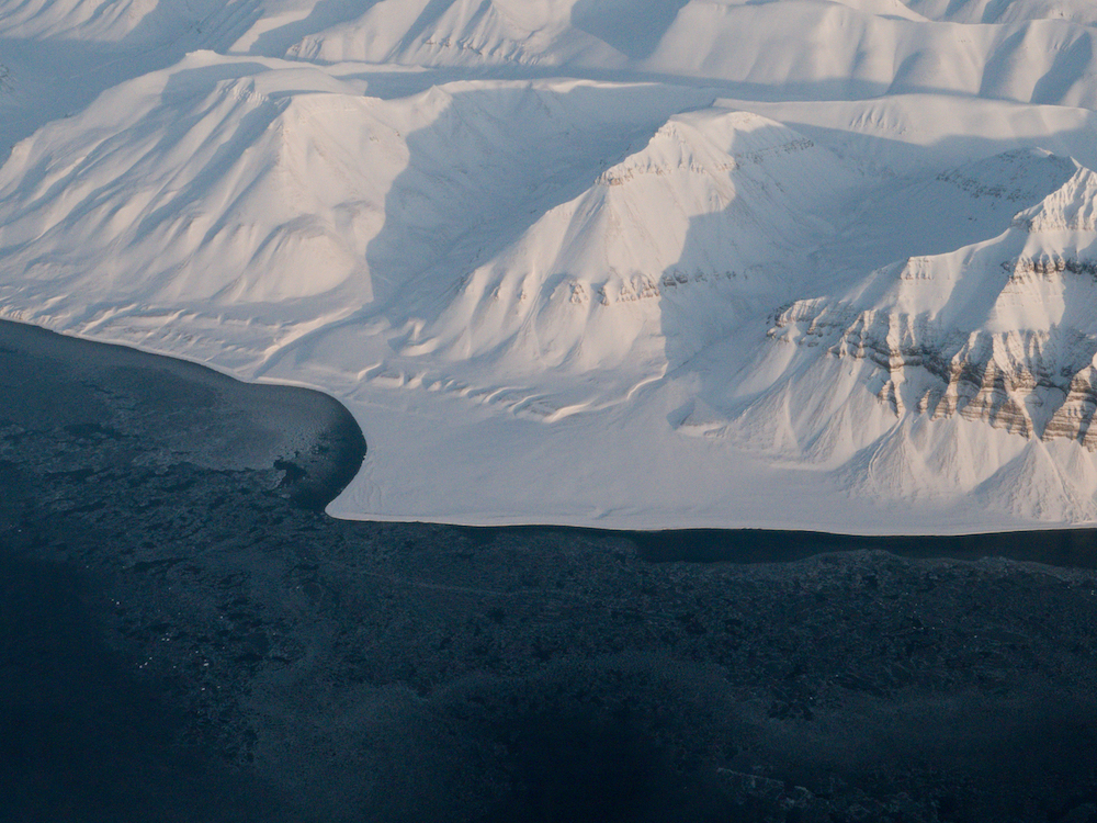 Aerial view of a frozen landscape in Svalbard, Norway