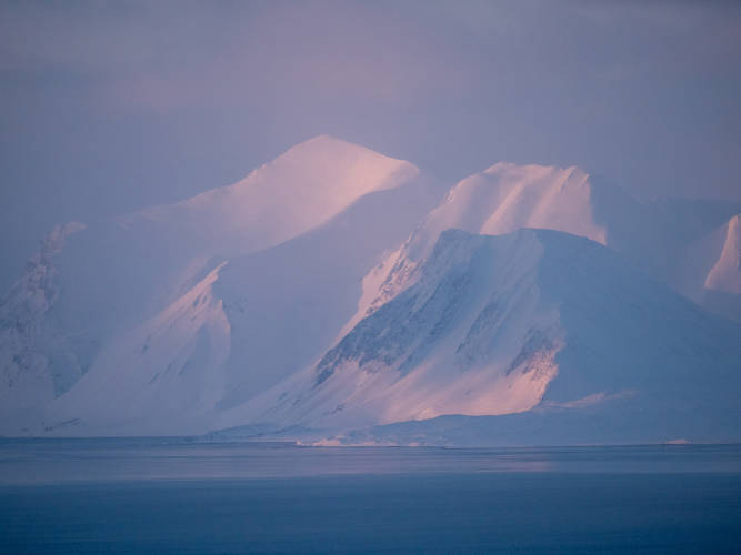 Snow-covered mountains in Svalbard