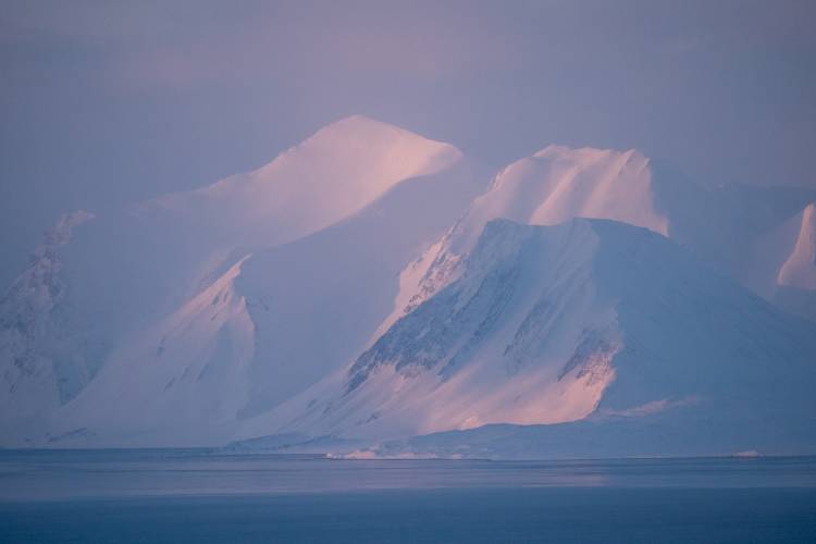 Snow-covered mountains in Svalbard