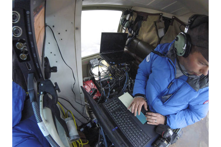 BYU researcher inside a helicopter in Churchill testing SAR