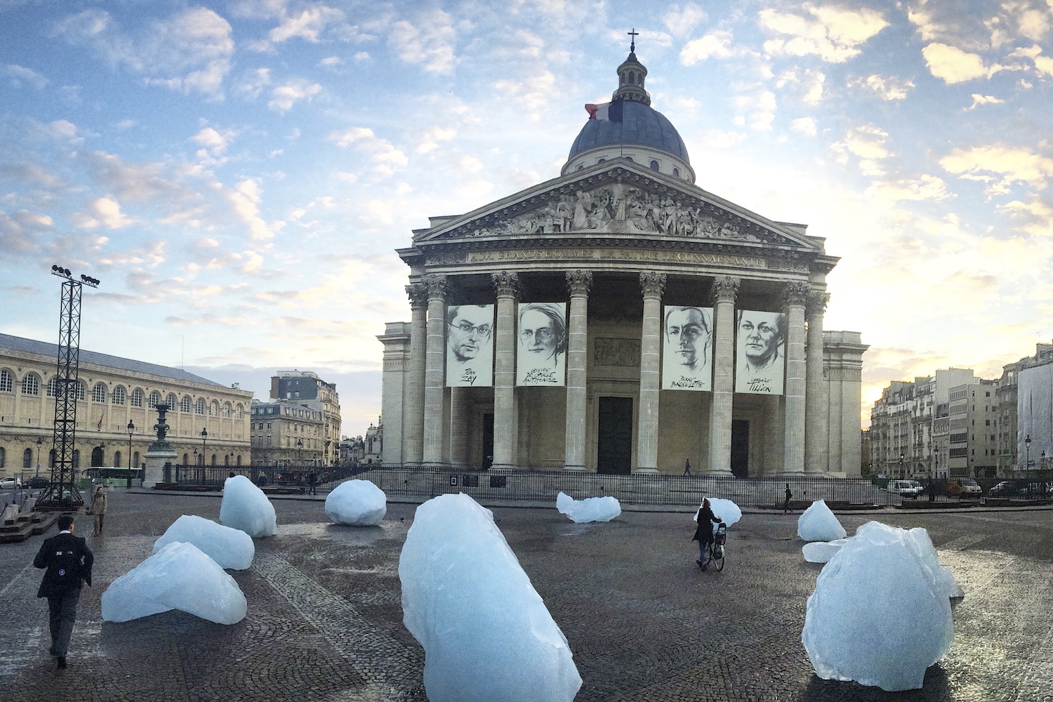 An ice clock, formed of chunks of ice from Greenland, melts in front of the Pantheon during the COP21 Paris climate summit