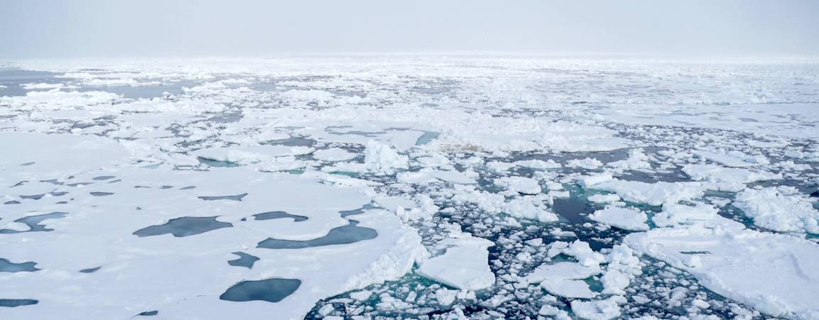 Broken Arctic sea ice forming