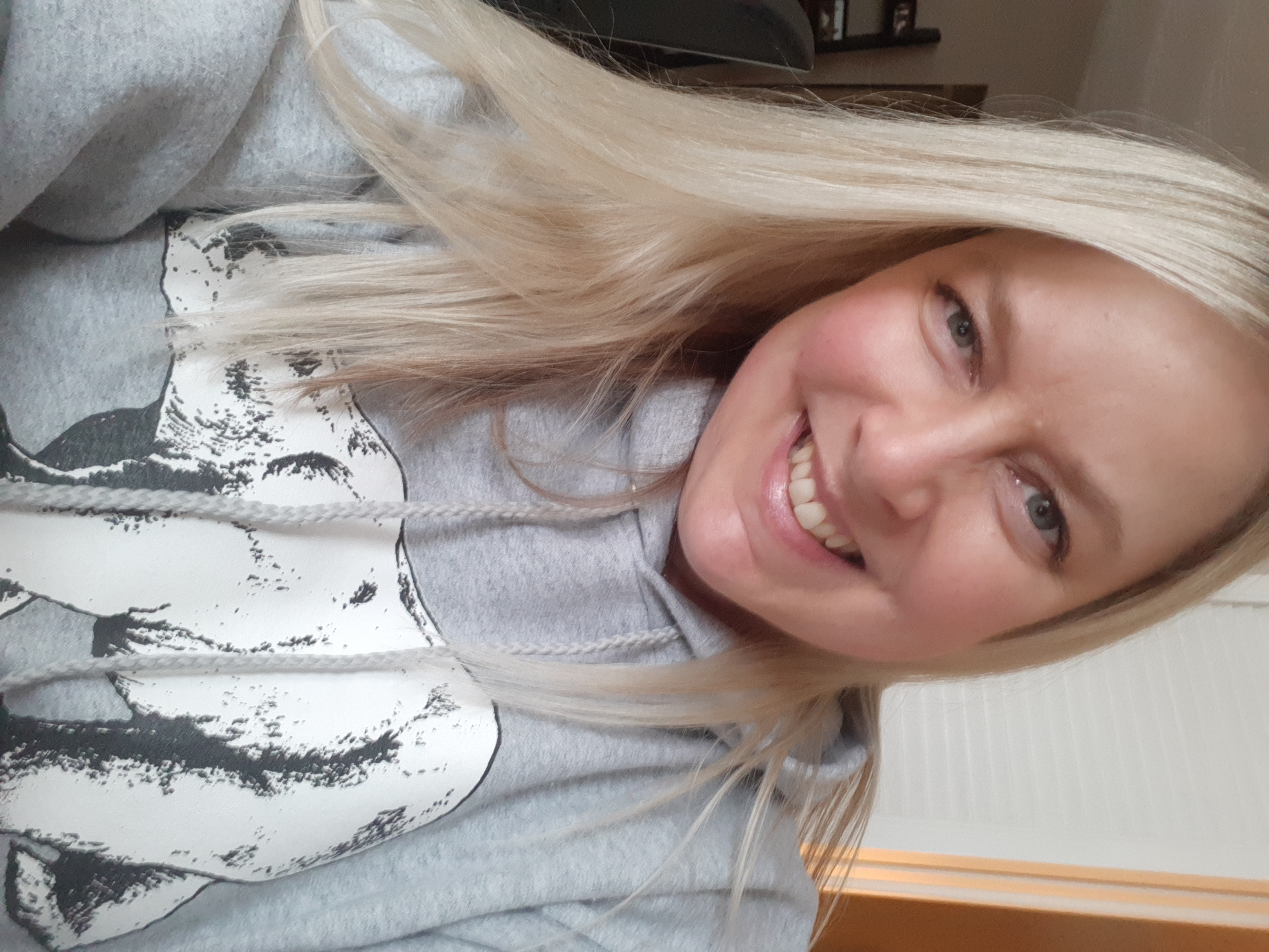 Selfie of Lenore N. wearing a polar bear hoodie