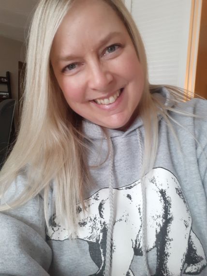 Selfie of Lenore N. wearing a polar bear hoodie