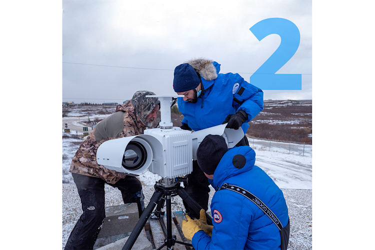 Polar Bears International employees building radar equipment