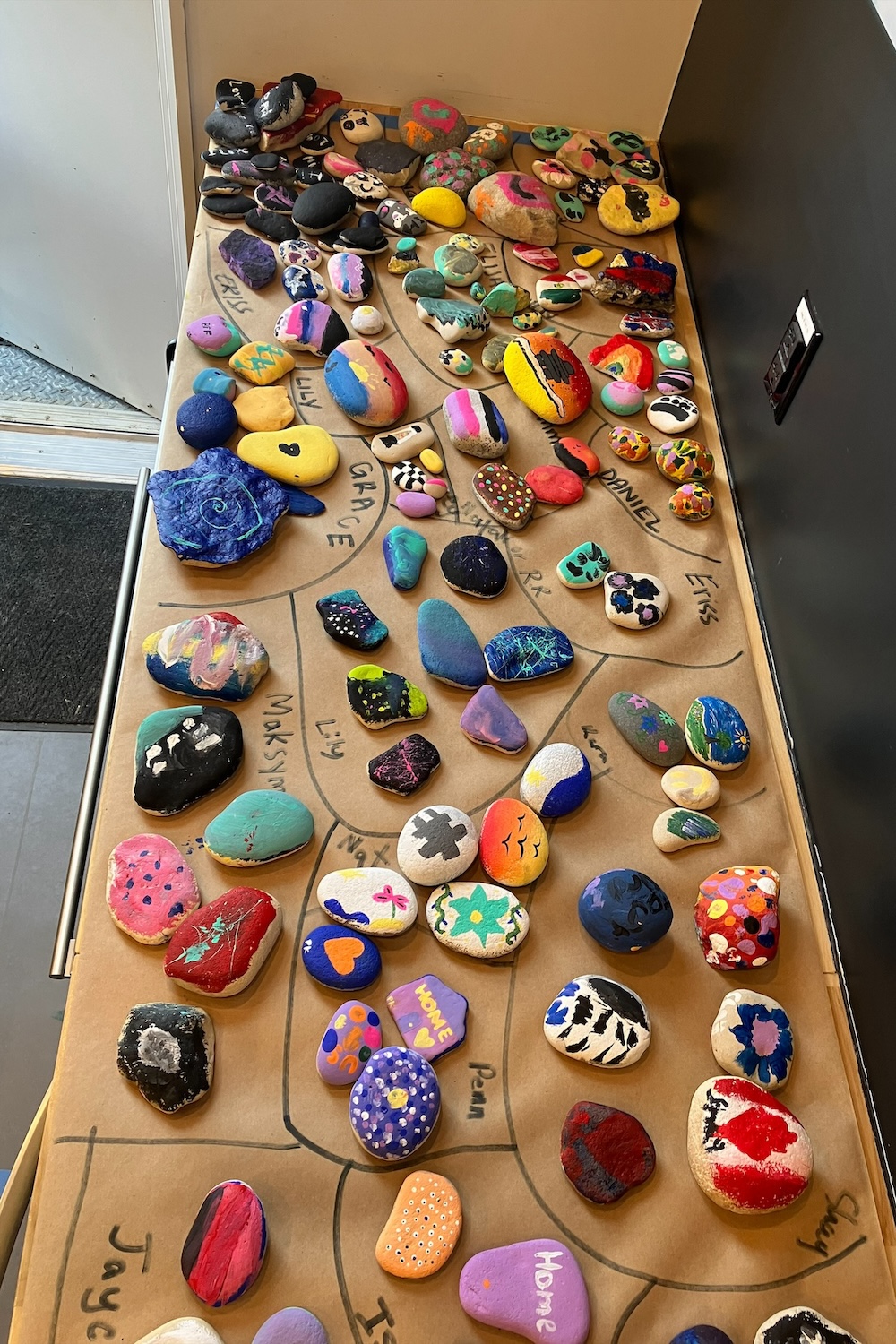 Rocks painted by Churchill children during summer camp