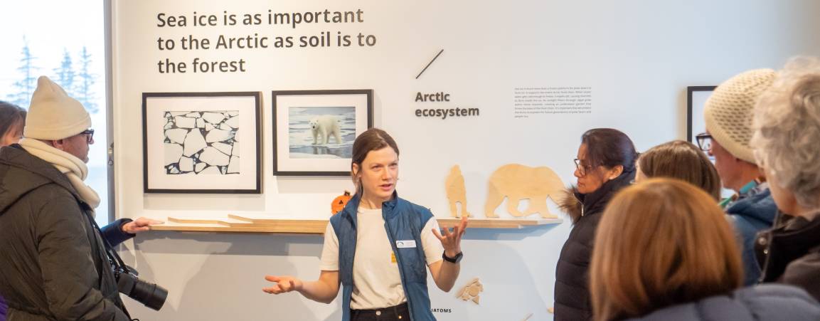 Field ambassador Joanna Sulich talks with guests inside the Polar Bears International House