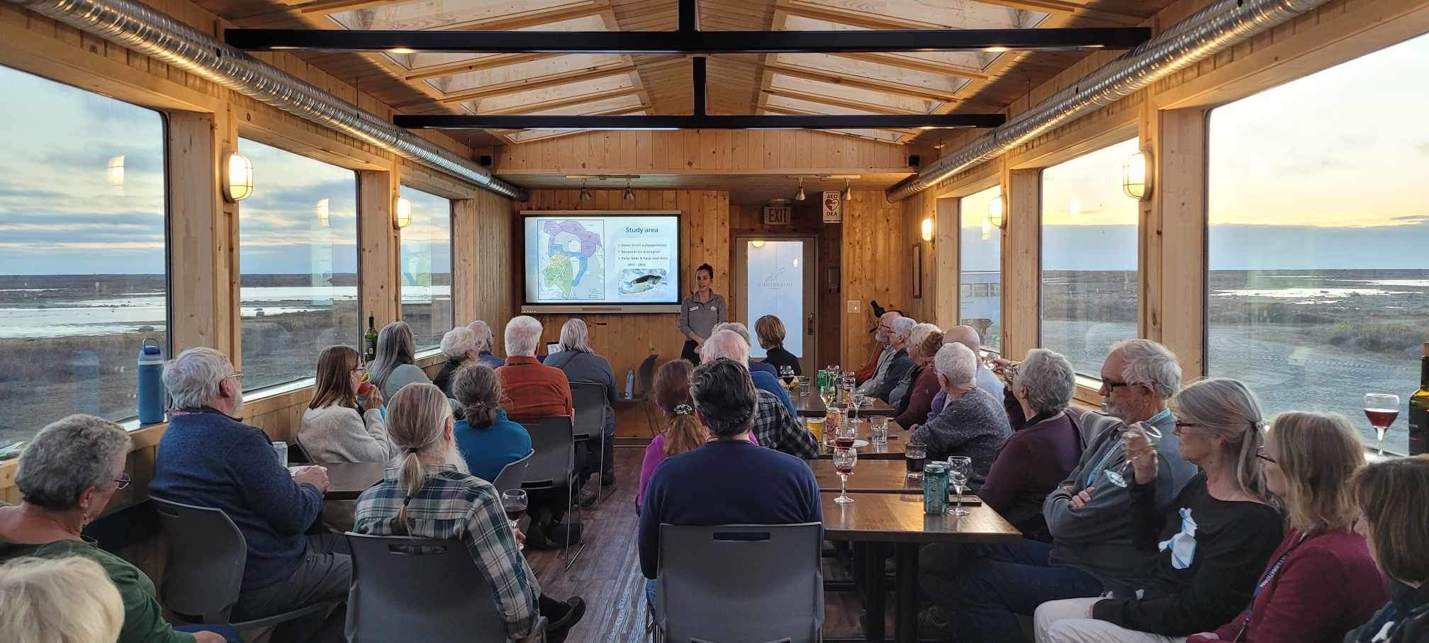Field Ambassador Larissa Thelin speaks with guests on the Frontiers North Adventures Lodge
