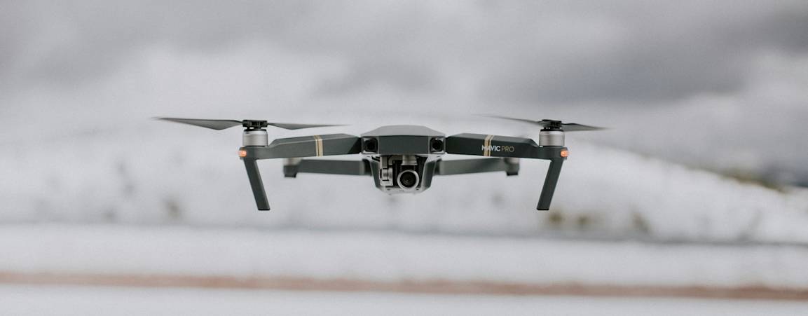 A DJI drone hovering in the air