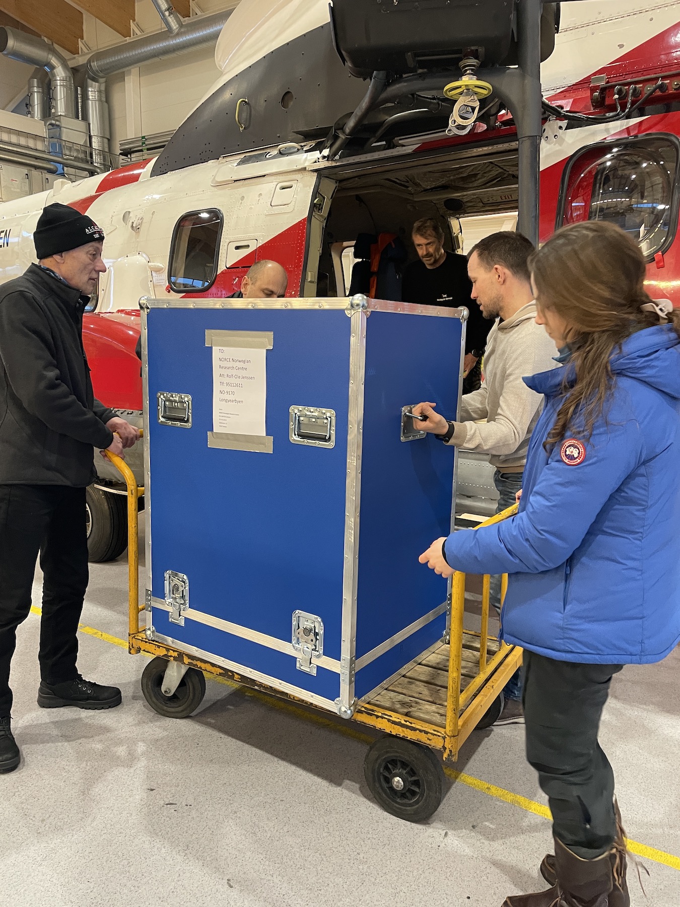 Loading the helicopter for our maternal den study