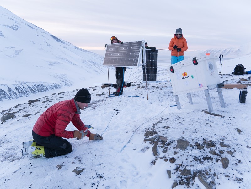 The Polar Bears International team sets up maternal den cams in Svalbard